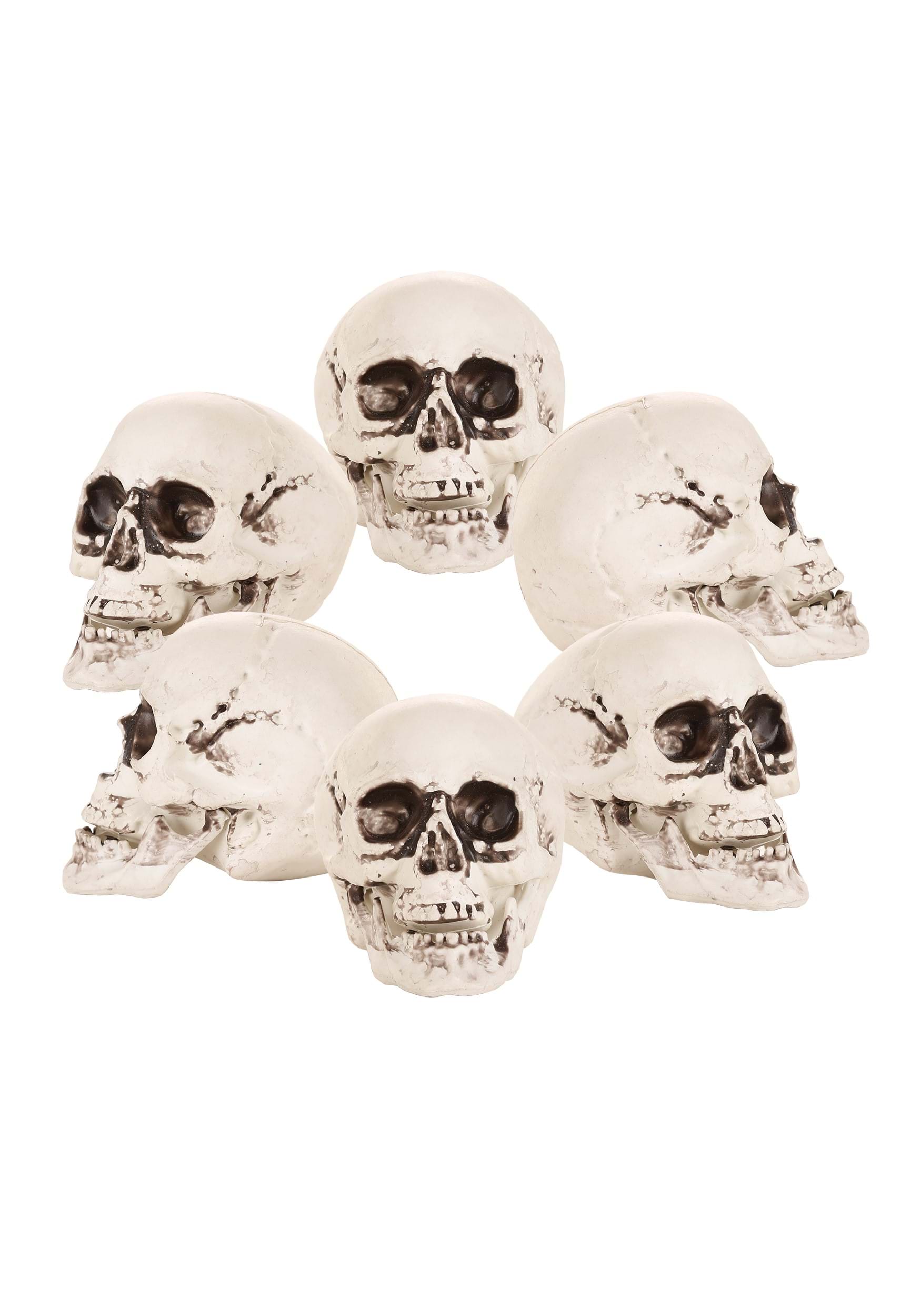 UPC 889851198322 product image for 4-Inch Bag of 24 Skulls Halloween Decoration | Halloween Skulls | upcitemdb.com