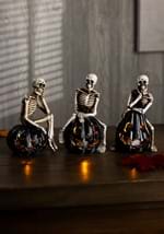 Set of Three Resin Skeletons Sitting on LED Jack O Alt 1